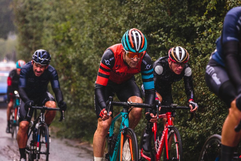 cyclists racing in the rain