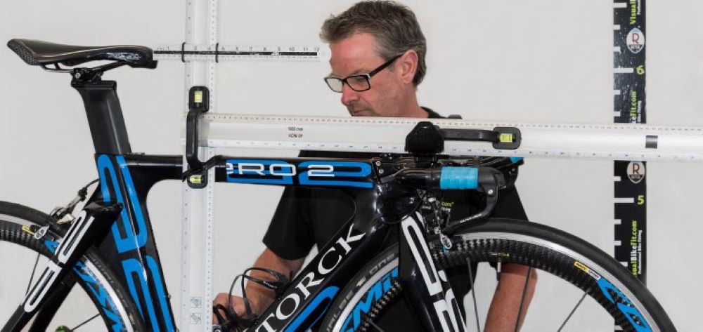 Drew Wilson at work in bike fitting studio