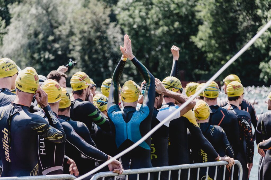 Swimmers in the start pen for a Triathlon race