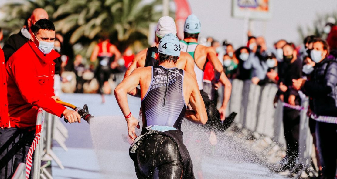 A competitor exits the water at a Triathlon event