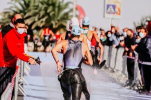 A competitor exits the water at a Triathlon event