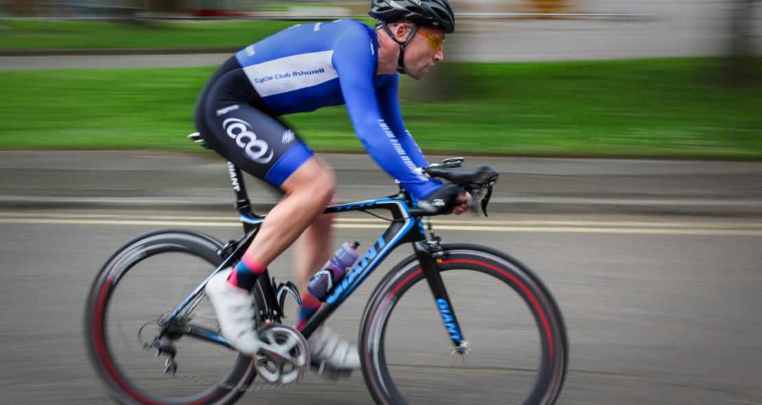 a racing cyclist riding a bicycle
